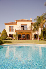 Swimming pool and Spanish villa