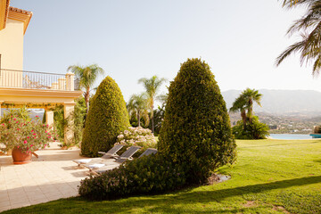 Garden surrounding courtyard doorway of luxury villa