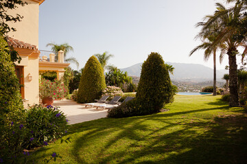 Garden surrounding courtyard doorway of luxury villa