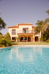 Swimming pool and Spanish villa