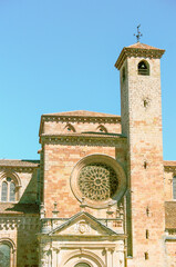 tower of the church in old medieval town of Spain during summer holiday.