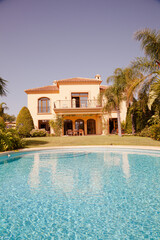 Swimming pool and Spanish villa