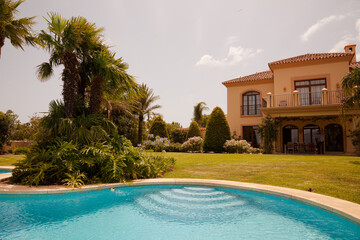 Luxury swimming pool and Spanish villa