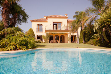 Swimming pool and Spanish villa