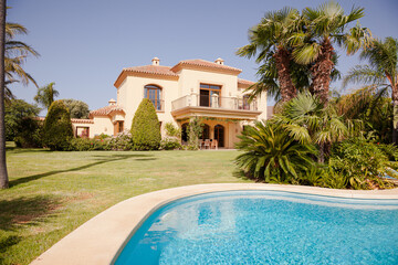 Swimming pool and Spanish villa