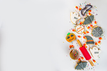Halloween treats background with sugared Gingerbread cookies and candies, Trick or treat concept...