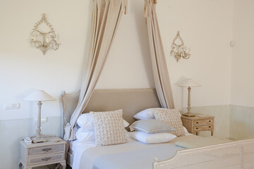 Bed with canopy in luxury bedroom