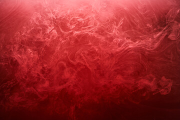Fototapeta na wymiar Abstract red ocean background, ruby paints in water, vibrant bright smoke scarlet wallpaper
