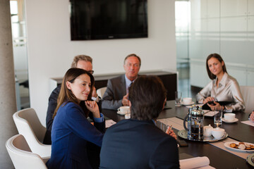 Business people talking in meeting