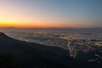 Naklejka premium city lights seen from the top of the corcovado hill in rio de janeiro, brazil.