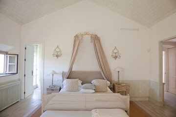 Bed with canopy in luxury bedroom