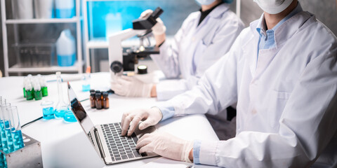 Health care researchers working in life science laboratory, medical science technology research...