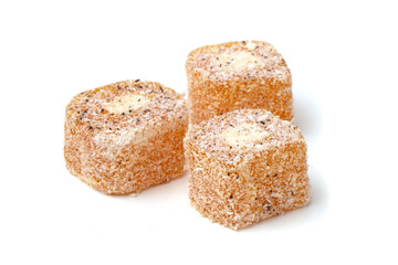 Traditional oriental sweets - Turkish Turkish delight on a white background.