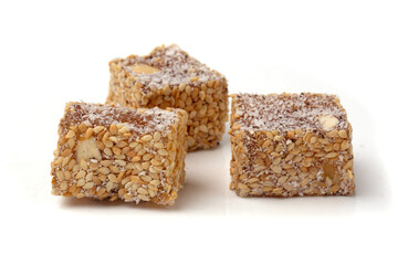 Traditional oriental sweets - Turkish Turkish delight on a white background.