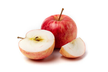 One colorful pink apple with half an apple on a white background.