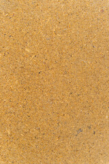 The texture of the panel made of pressed chips. Wooden background.