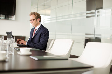 Businessman working on computer at desk