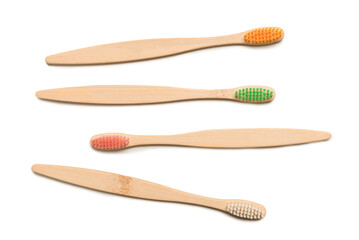 Bamboo toothbrush isolated on a white background.