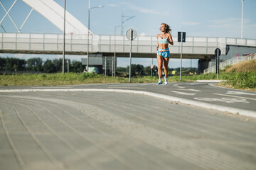 Middle Age Sportswoman Jogging Outdoor