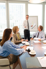 Business people talking in meeting
