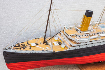 Close up view of a part of ship model of Titanic handmade. Beautiful Handmade model of Titanic isolated on backgrounds.	 - obrazy, fototapety, plakaty