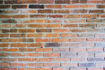The textures of the orange old blocks are arranged beautifully and neatly to be the wall