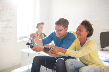 Couple playing video games together