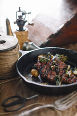 Steak and potatoes on a pan