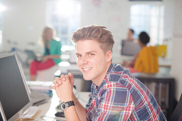 Businessman working at computer at desk