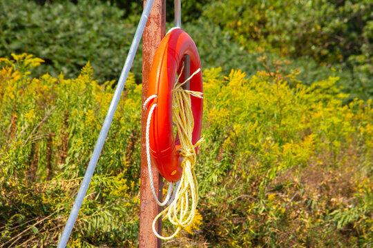 Orange lifesaver and yellow rope