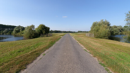 Country road in La Bassée National Nature reserve. Grisy-sur-Seine village