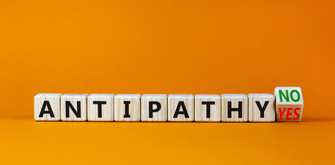 Antipathy yes or no symbol. Turned a wooden cube and changed words 'antipathy no' to 'antipathy...