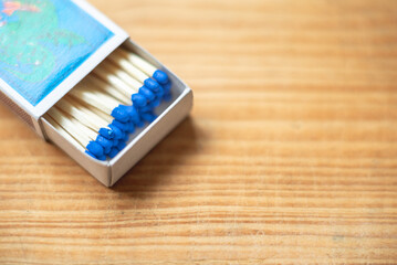 Box of matches.Wooden background.copy space.Open box of matches.closeup.