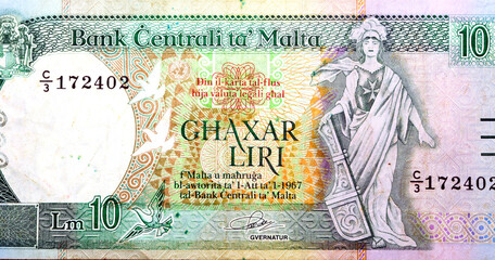 Large part of the obverse side of 10 ten Maltese lira banknote currency issued 1989 by the central...