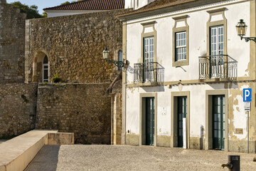 Fototapeta na wymiar Medieval oceanfront castle with crenellated walls and ornate Manueline window in Lagos, Portugal