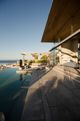 Infinity pool and patio of modern house
