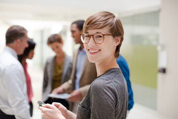 Obraz premium Businesswoman smiling in meeting