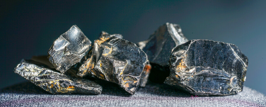 Shungit is a black rock that consists mainly of carbon and was photographed in top quality and studio quality.