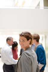 Businesswoman smiling in meeting