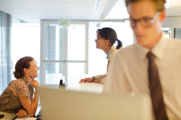 Businessman using laptop in office