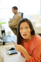 Businesswoman sitting at desk