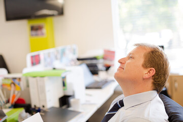 Businessman thinking at desk