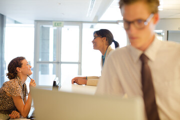 Businessman using laptop in office