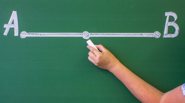 A segment with two dots drawn in white chalk on a green blackboard and a space for copying. Concept-math lesson or business success