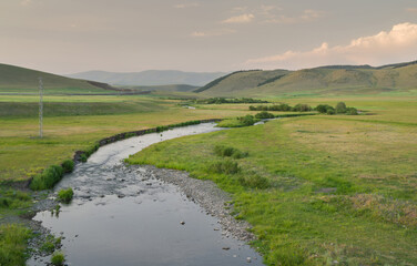 Fototapeta na wymiar Beautiful view of river curve,green and yellow fields.