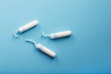 Gynecological tampons on a blue background free space