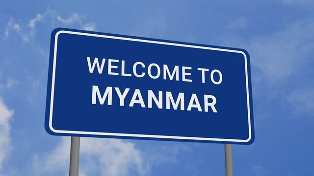 Welcome to Myanmar Road Sign on Clear Blue Sky with Rapid Moving Clouds