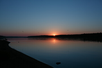 Sunset on the river in summer.
