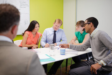 Business people talking in meeting