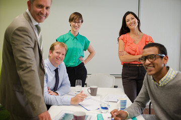 Business people smiling in meeting